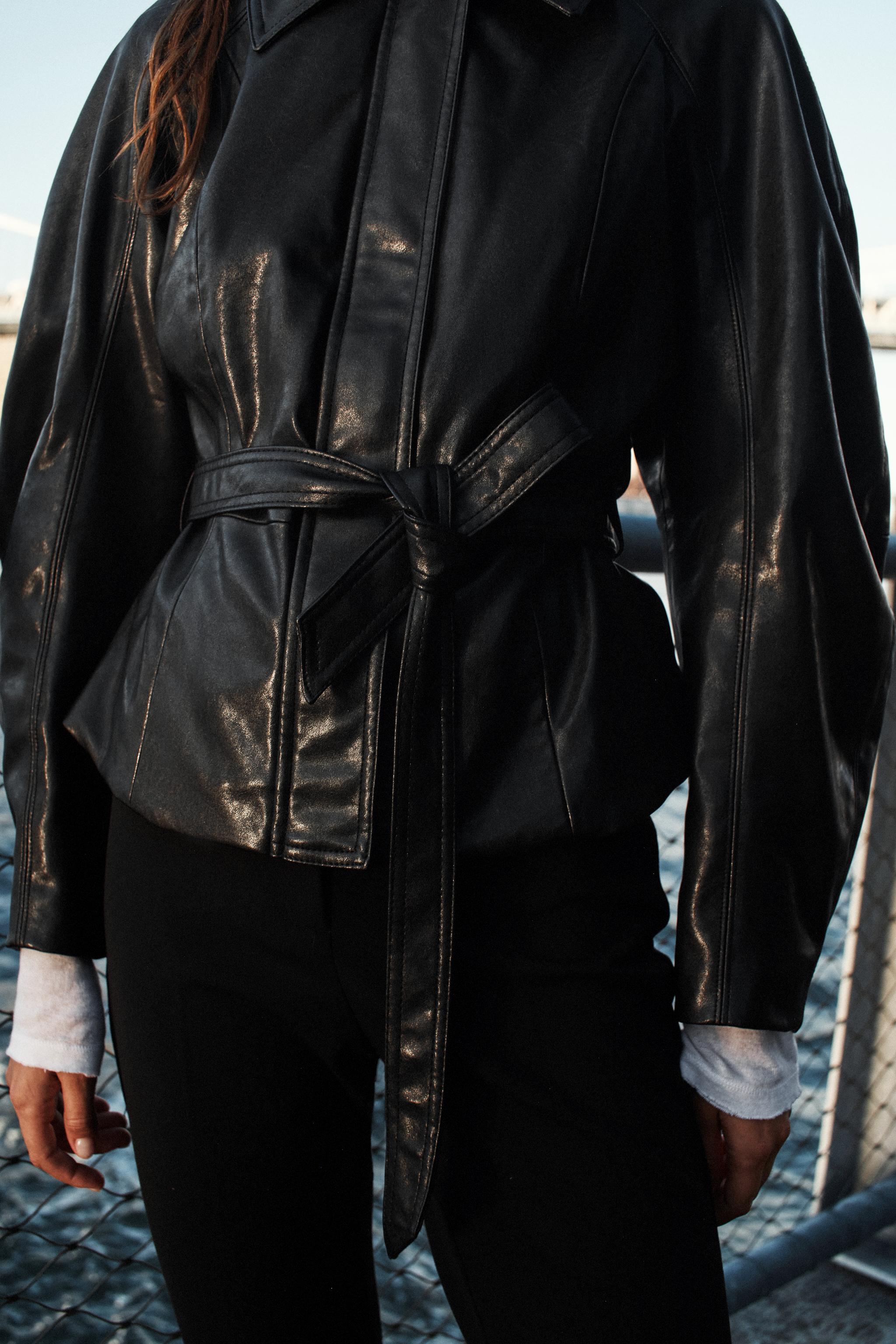 LEATHER-EFFECT BELTED JACKET